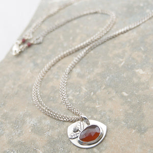 Handcrafted Garnet birthstone necklace featuring a tiny white sapphire accent, 19 inches