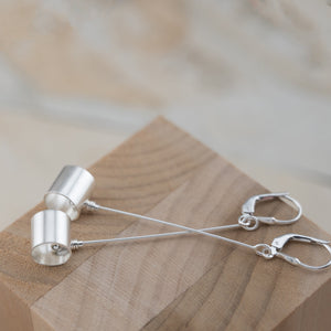 Long sterling silver dangle spinner earrings