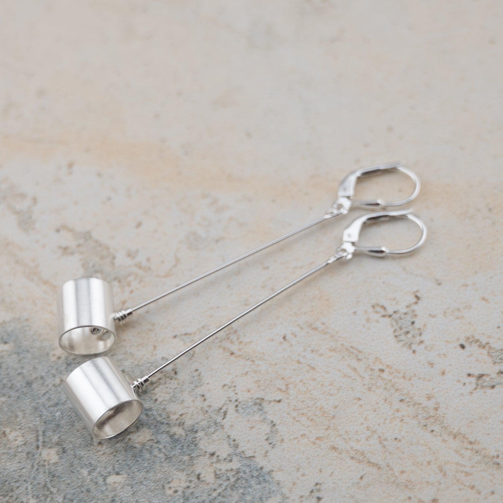 Long sterling silver dangle spinner earrings