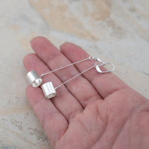 Long sterling silver dangle spinner earrings