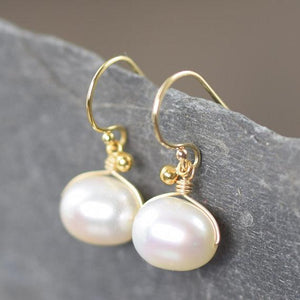 White freshwater pearl drop earrings wire wrapped in gold filled wire