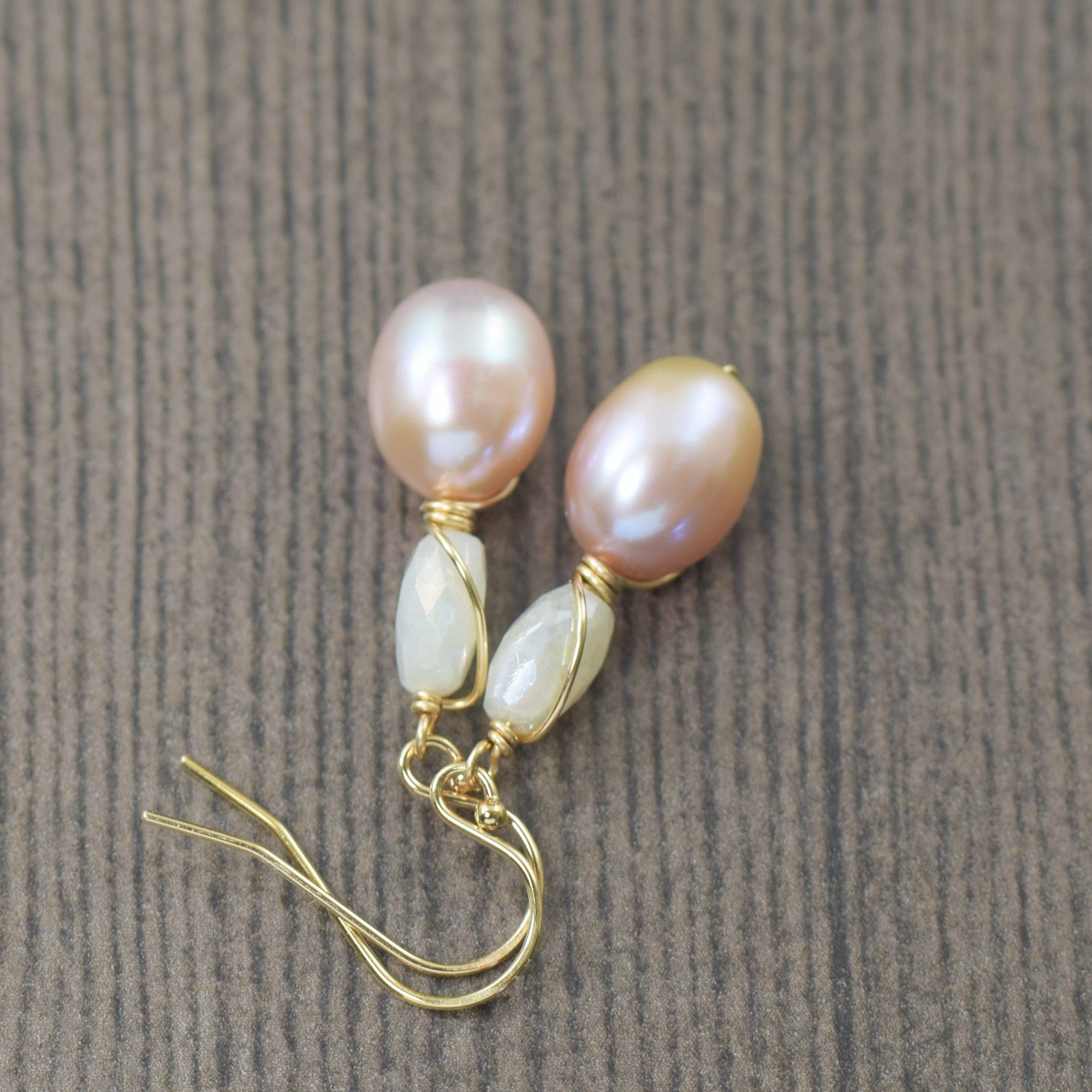 Light pink pearl earrings wire wrapped in gold filled accented by silverite gemstones
