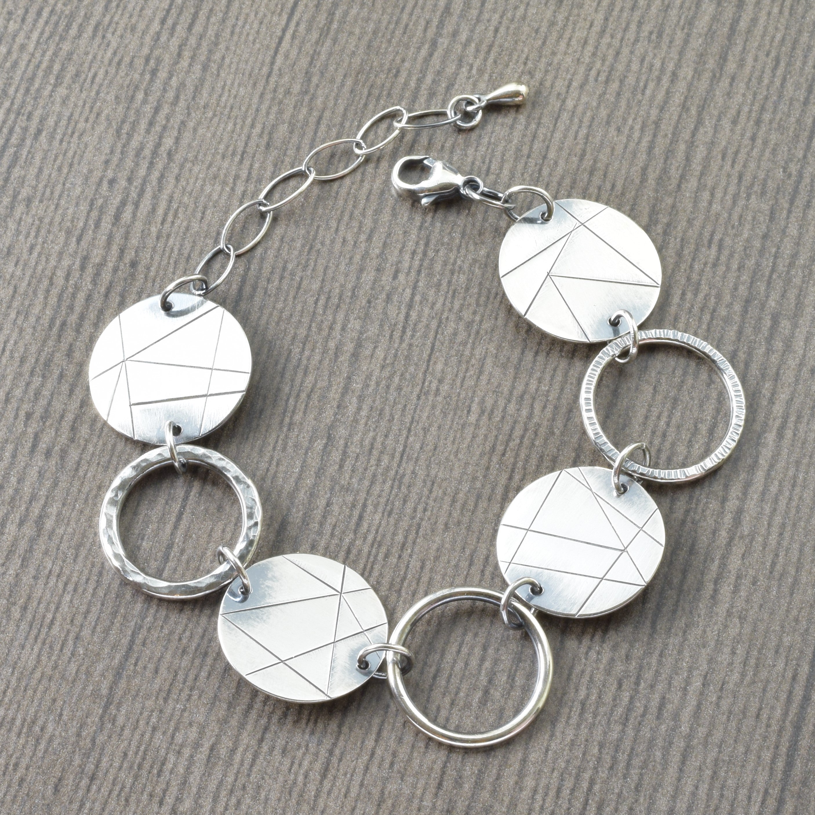 Modern linear Sterling silver geometric statement bracelet