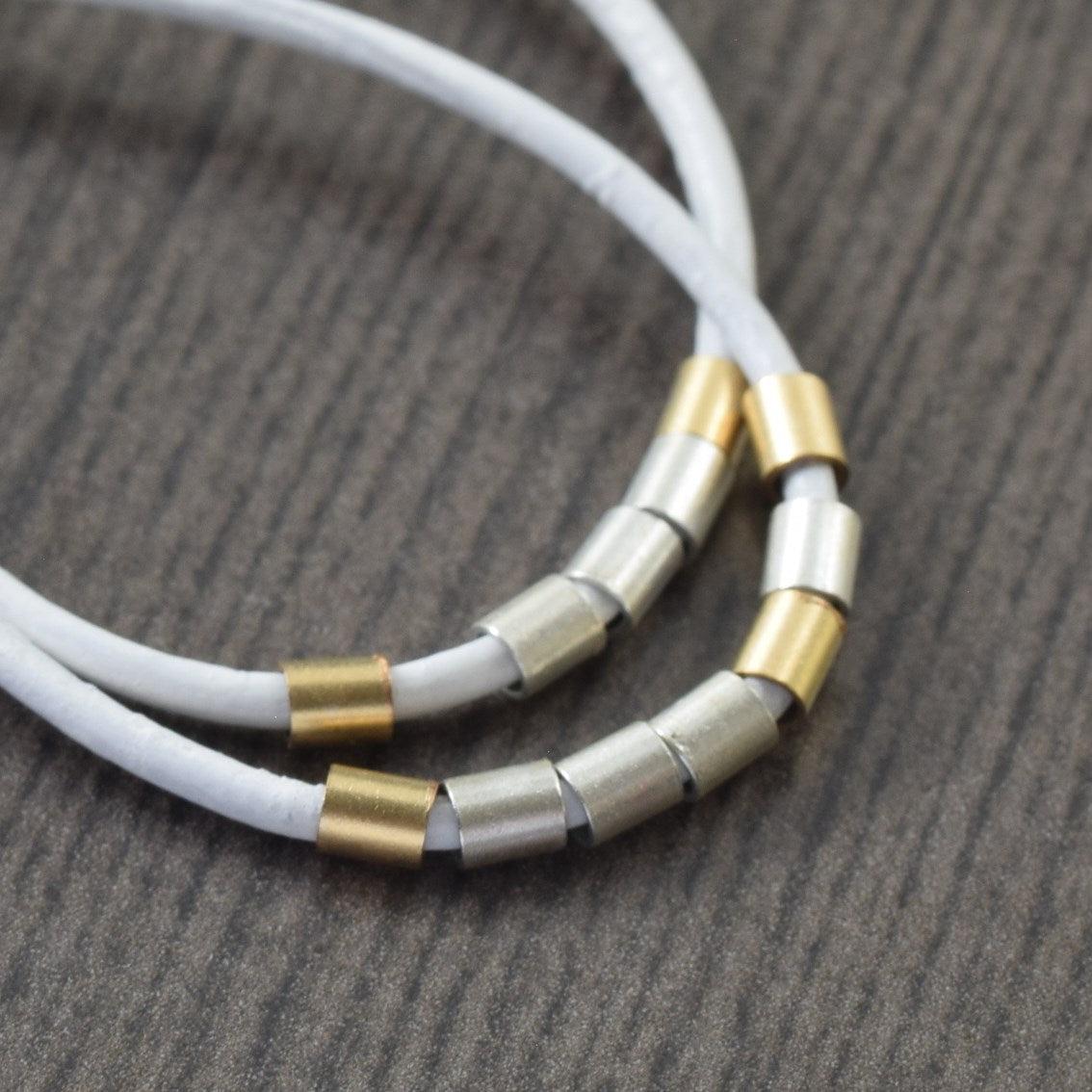 White Leather hoop earrings with gold and sterling silver accents